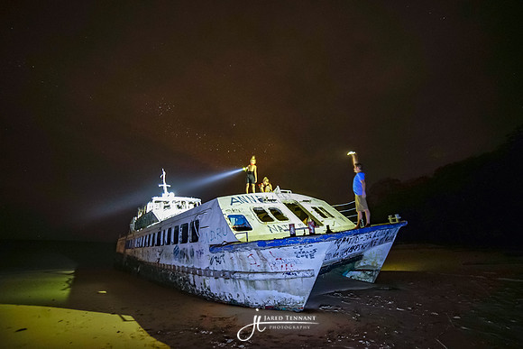 An abandoned passenger ferry on the beach